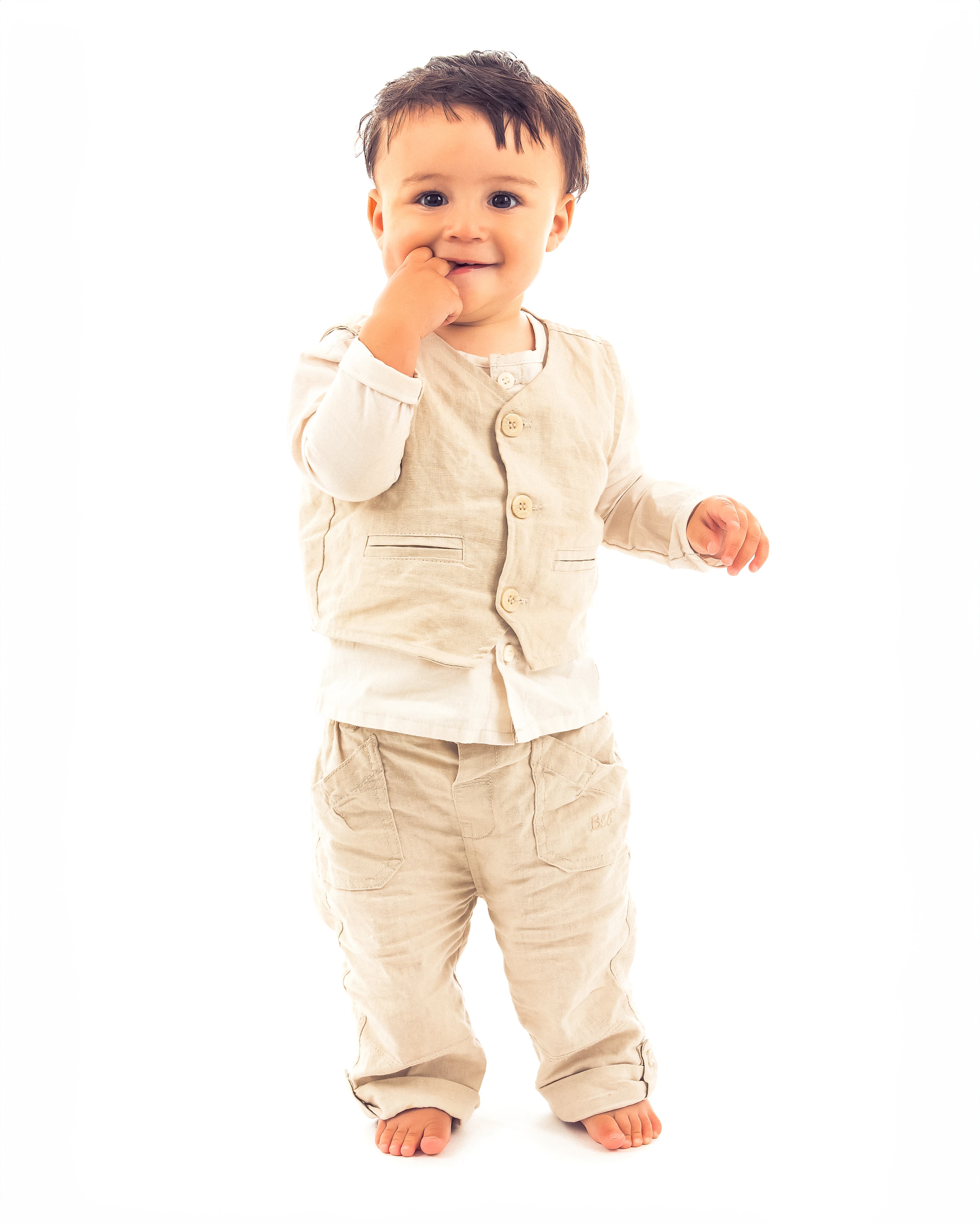 Baby boy standing in Edinburgh studio